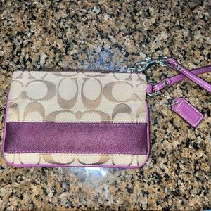 Coach lettering with purple wristlet